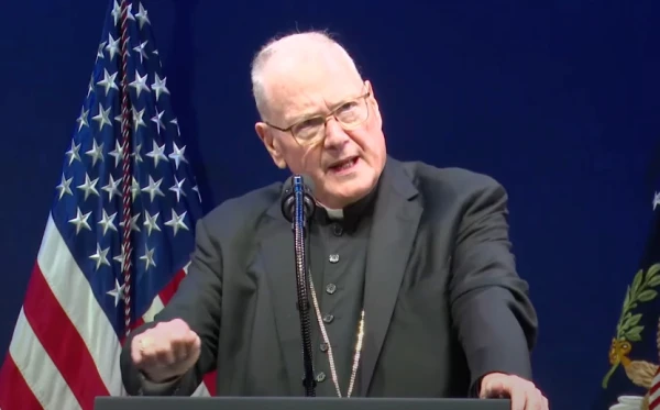 Cardinal Timothy Dolan emphasized the importance of the commission's work. Credit: U.S. Department of Justice/Screenshot