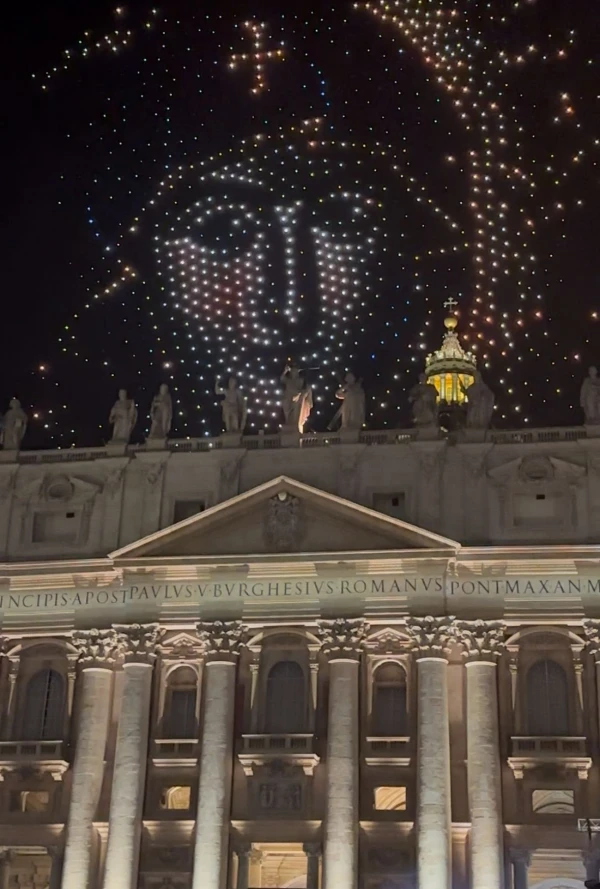 Illuminated drones reproduce a detail of the icon "Salus Popoli Romani" above St. Peter's Basilica at the Vatican on September 14, 2025. Courtney Mares