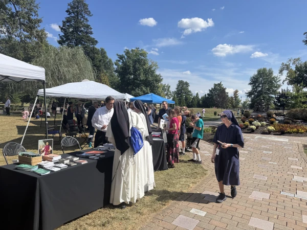 Dominican nuns walk around the 