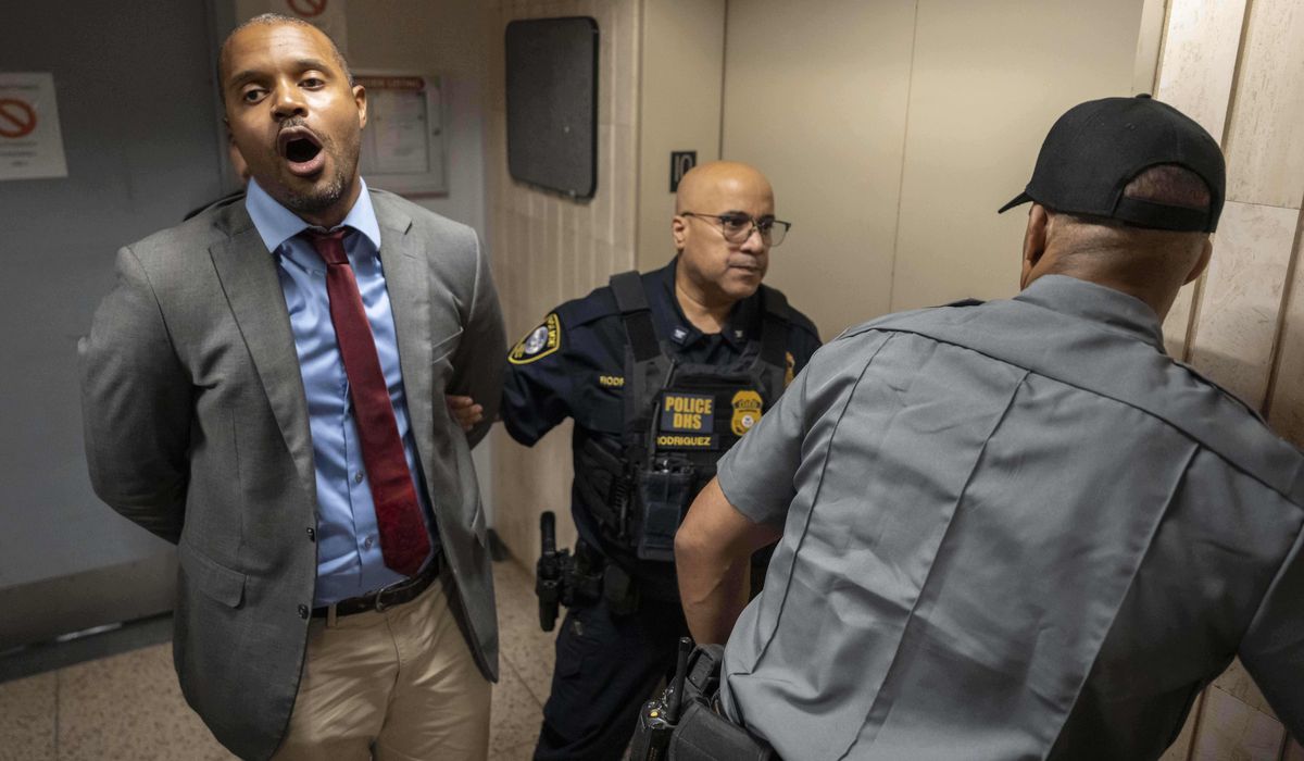 Officials and dozens of protesters are arrested at Manhattan immigration holding facility