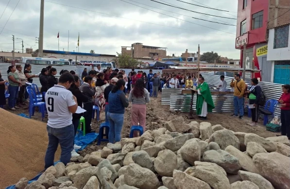 Mass at the site where the church is being built. Credit: Photo courtesy of Father Javier Cajusol