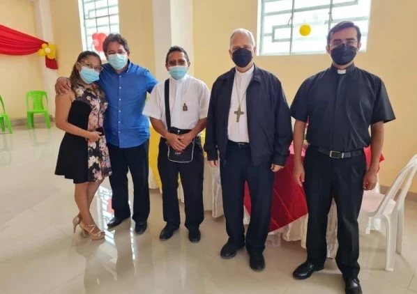 From left to right: a couple of parishioners, Father Javier Cajusol, Pope Leo when he was bishop of Chiclayo, and his secretary. Credit: Courtesy of Father Javier Cajusol