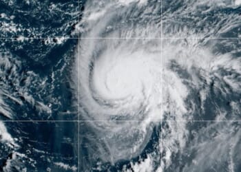 Two tropical storm systems near each other could wind up shielding the Carolinas from damage