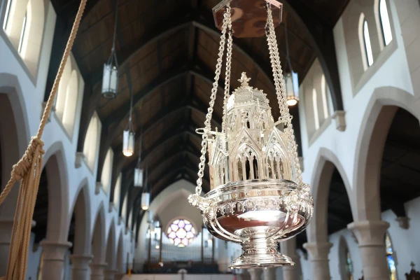 On feast days of the Church, Christendom's thurible is brought near the central altar where it is hoisted on chains and swung by senior students. Credit: Courtesy of Christendom College