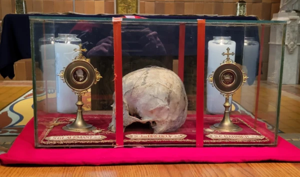 The major relic of St. Jean de Brebeuf, his skull, flanked by major relics of St. Gabriel Lalemant (left) and St. Charles Garnier (right), both bone fragments. Credit: The Shrine of the Canadian Martyrs Photos