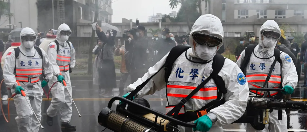 Soldiers take part in a drill organized by the New Taipei City government to prevent the spread of the COVID-19 coronavirus, in Xindian district on March 14, 2020. (Photo by Sam Yeh / AFP) (Photo by SAM YEH/AFP via Getty Images)