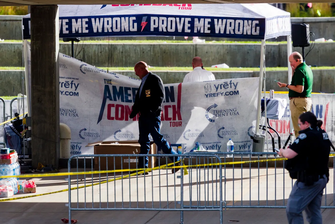OREM, UTAH - SEPTEMBER 12: Authorities walk the crime scene at Utah Valley University where political activist Charlie Kirk was shot during an event at the campus on September 12, 2025 in Orem, Utah. Utah Gov. Spencer Cox announced that suspect in the fatal shooting, 22-year-old Tyler Robinson, was arrested in St. George, Utah late last night. (Photo by Michael Ciaglo/Getty Images)