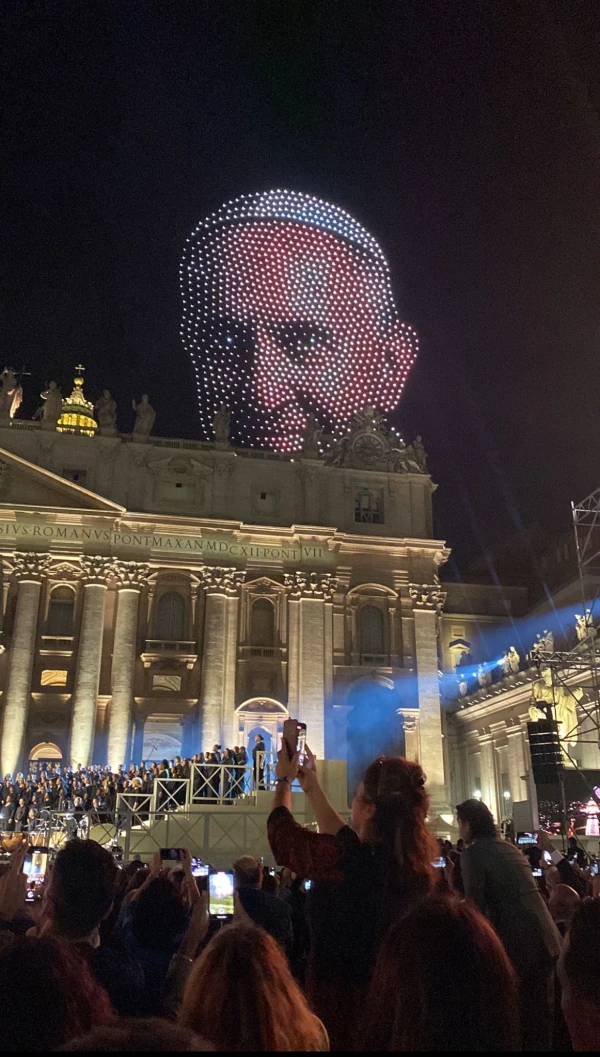 Illuminated drones portray Pope Francis above St. Peter's Basilica at the Vatican on September 14, 2025. Eva Fernández