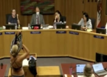 Woman strips at California school board meeting to protest trans locker room policies