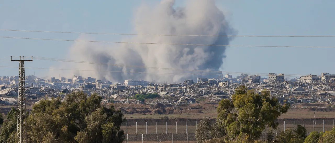 This picture taken from a position at Israel's border with the Gaza Strip shows smoke billowing amid Israeli bombardment of the besieged Palestinian territory on September 16, 2025, amid the ongoing war between Israel and the Palestinian Hamas militant group. (Photo by MENAHEM KAHANA/AFP via Getty Images)