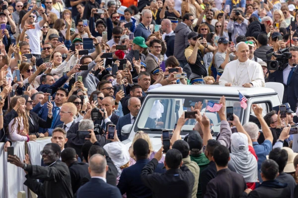 Pope Leo XIV rides on the popemobile through crowds gathered for his weekly public audience in St. Peter's Square on Oct. 1, 2025. Credit: Daniel Ibanez/CNA