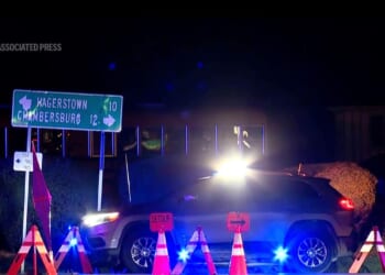 Two Pennsylvania state police officers are shot in exchange of gunfire with suspect who was killed