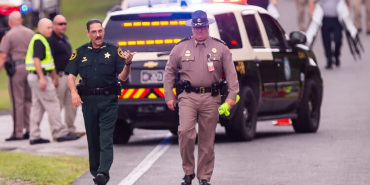 Small Child Running on Highway Saved by Officer in Split-Second Response [WATCH]