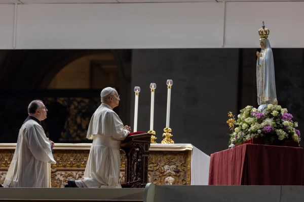 Pope Leo XIV prays before the original Our Lady of Fatima statue at a Marian vigil in St. Peter's Square, Rome, Saturday, Oct. 11, 2025. Credit: Daniel Ibáñez/CNA