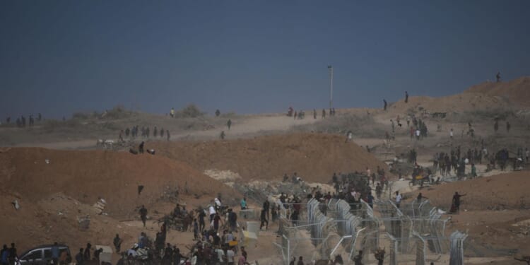 Food sites run by controversial U.S.-Israeli-backed group in Gaza are being shut down, officials say