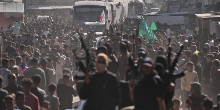 Trump warns Hamas to disarm or 'we will disarm them'