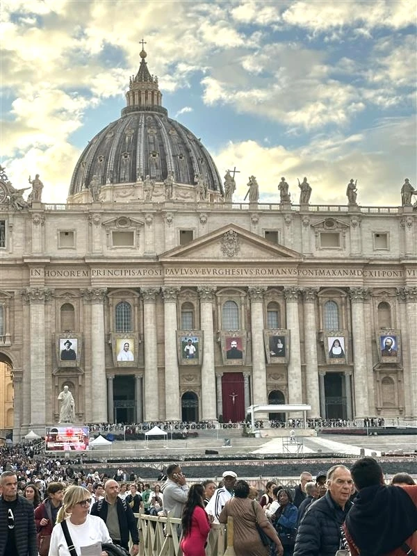 Pope Leo XIV will canonize seven new saints on Sunday including an Italian lawyer who renounced Satanism, a martyred Armenian archbishop, and a Venezuelan considered the “doctor of the poor.” Banners of the new saints are on display on St. Peter's Basilica for all to see in St. Peter's Square. Credit: Couttney Mares / CNA