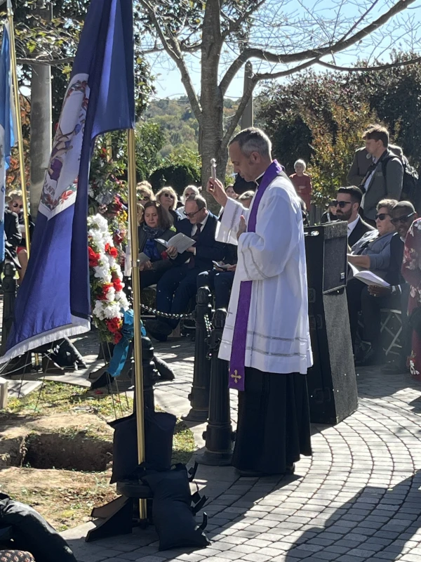 Father Tony Marques blesses the grave of Eliza Monroe Hay during her reinterment at Hollywood Cemetery in Richmond, Virginia, on Thursday, Oct. 23, 2025. Credit: Daniel Payne/CNA