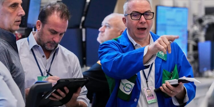 Wall Street reaches records following an encouraging update on inflation