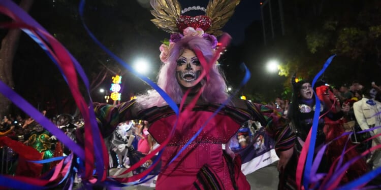 LGBTQ+ collective walks in Mexico City's Catrina parade ahead of Day of the Dead celebrations