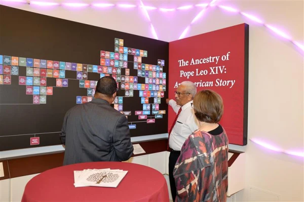 Guests examine Pope Leo XIV's family tree at American Ancestors headquarters in Boston. Credit: Claire Vail, VP of Communications & Digital Strategy for American Ancestors