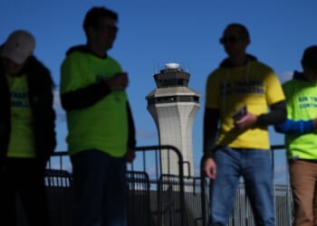 Isolated flight delays may spread as air traffic controllers go without pay during shutdown