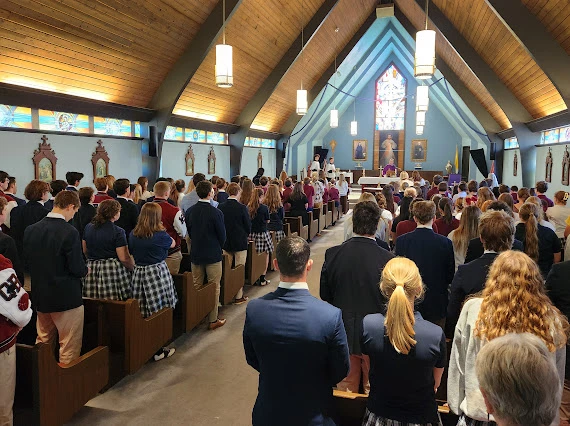 Faustina students attend Mass. Credit: Photo courtesy of Faustina Academy