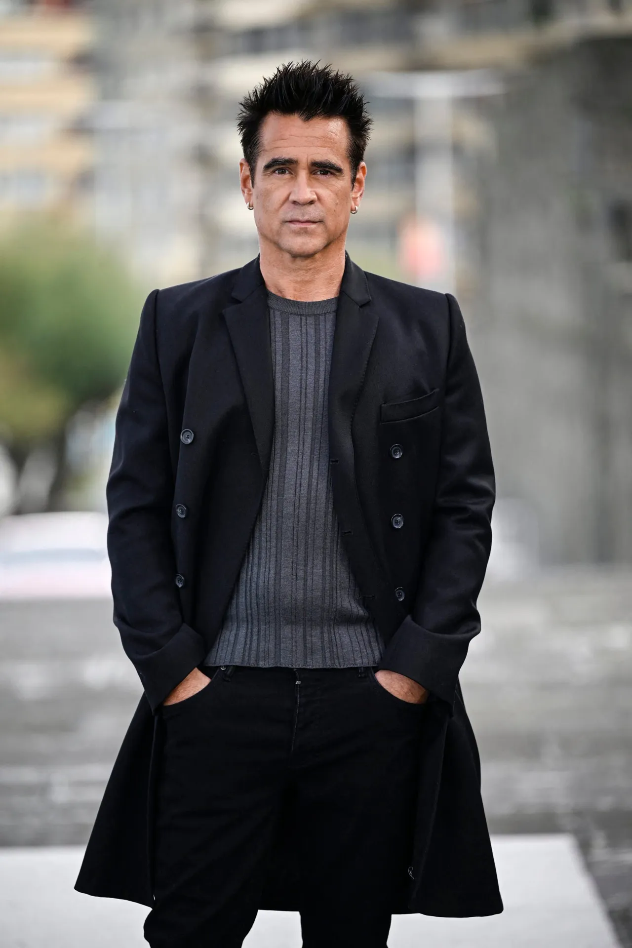 Irish actor Colin Farrell poses to promote the film