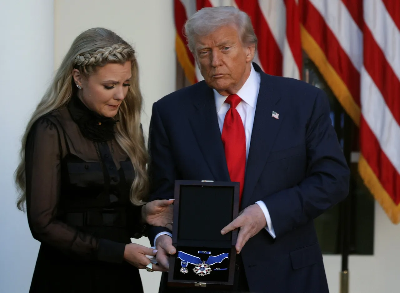 President Donald Trump posthumously awards the Presidential Medal of Freedom to late Charlie Kirk as he presents the Medal to his wife Erika Kirk. (Photo by Alex Wong/Getty Images)