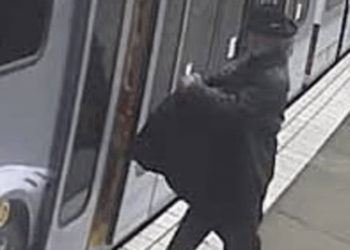 Chilling footage of man dragged to his death after his coat gets caught in commuter train door