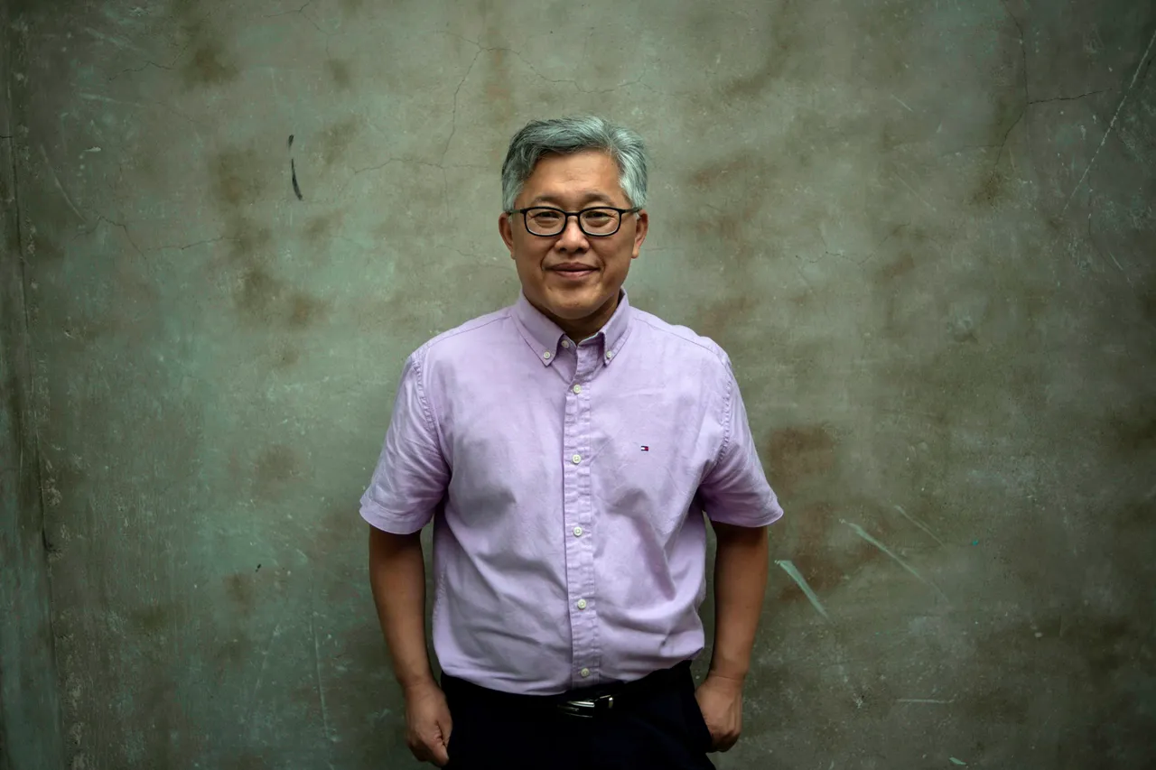 This photo taken on September 12, 2018 shows Jin Mingri, head pastor of the Zion church, posing in Beijing days after authorities shut down one of China's largest "underground" Protestant churches. - A Chinese Protestant pastor is vowing to keep preaching to his flock despite the closure of his prominent underground church in Beijing, defying the government's intensifying pressure on religious groups. (Photo credit should read FRED DUFOUR/AFP via Getty Images)
