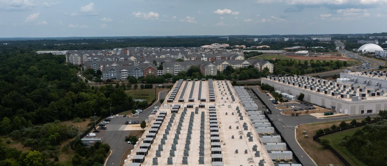 In an aerial view, the IAD71 Amazon Web Services data center is shown on July 17, 2024 in Ashburn, Virginia. (Photo by Nathan Howard via Getty Images)