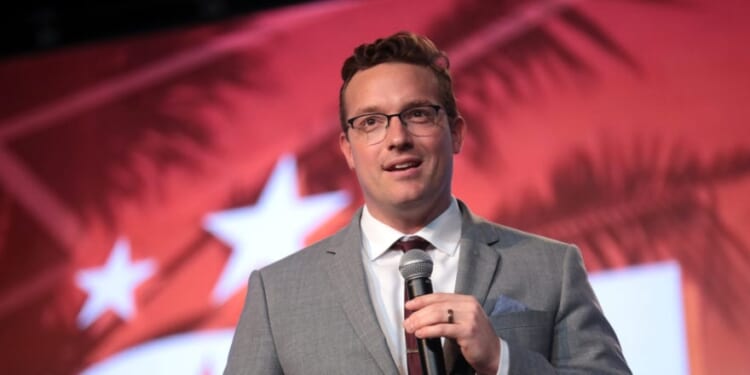 DOJ charges suspect with sending death threat to Benny Johnson