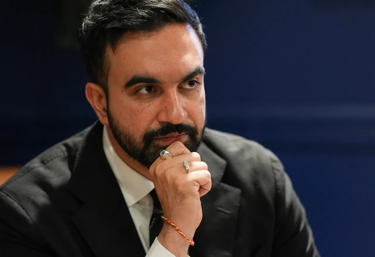 Democratic mayoral nominee Zohran Mamdani looks over notes in the green room before participating in a mayoral debate. (Photo by Angelina Katsanis-Pool/Getty Images)
