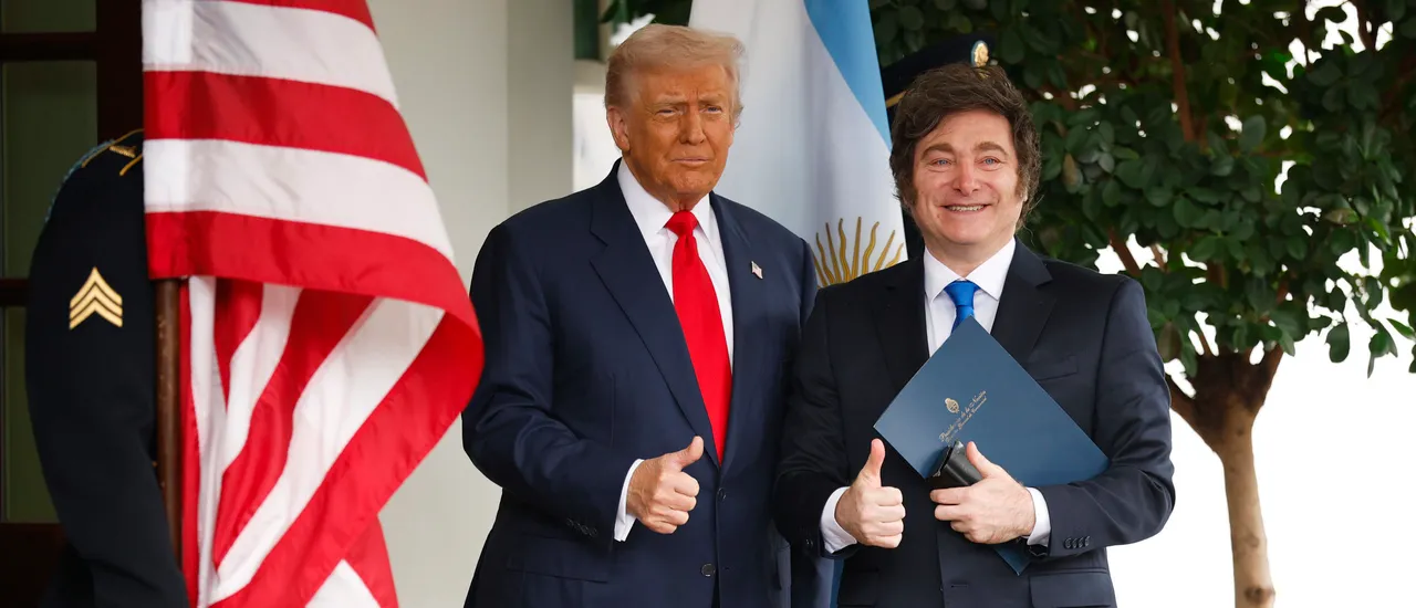 U.S. President Donald Trump greets President of Argentina Javier Milei as he arrives at the West Wing of the White House on October 14, 2025 in Washington, DC.