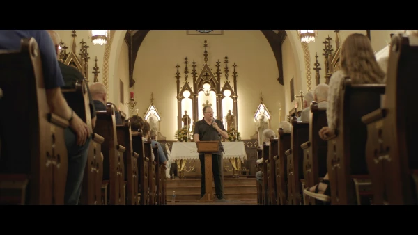 Kevin Matthews, former radio personality, speaks at a Catholic parish. His true story is told in the new documentary