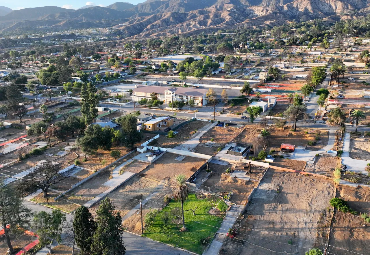 An aerial view of properties impacted by the Eaton Fire amid recovery efforts on September 19, 2025 in Altadena, California. (Photo by Mario Tama/Getty Images)