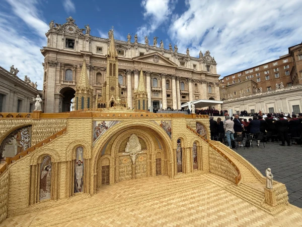 An Italian-made replica of the Shrine of Our Lady of Lourdes, in France, crafted entirely out of wheat stalks, sits in front of St. Peter's Basilica during Pope Leo XIV's Wednesday general audience on Oct. 1, 2025. Credit: Daniel Ibanez/CNA