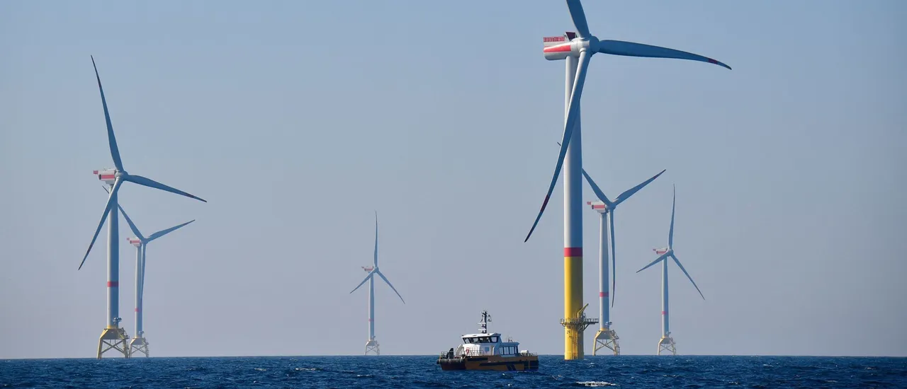 Wind turbines are pictured during the inauguration day of the Arkona wind park on April 16, 2019, in the Baltic Sea, northern Germany. (Photo by TOBIAS SCHWARZ/AFP via Getty Images)