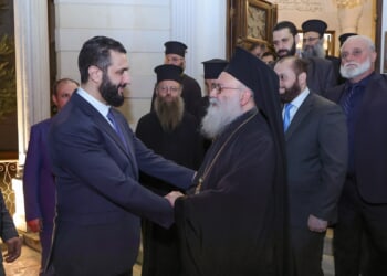 Syrian transitional president visits Greek Orthodox Patriarch John X Yazigi in Damascus