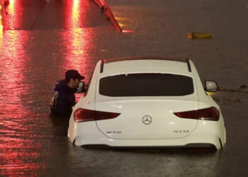 Wild Video Shows Man, Child Trapped On Top Of Car Surrounded By Roaring Floodwaters In Arizona