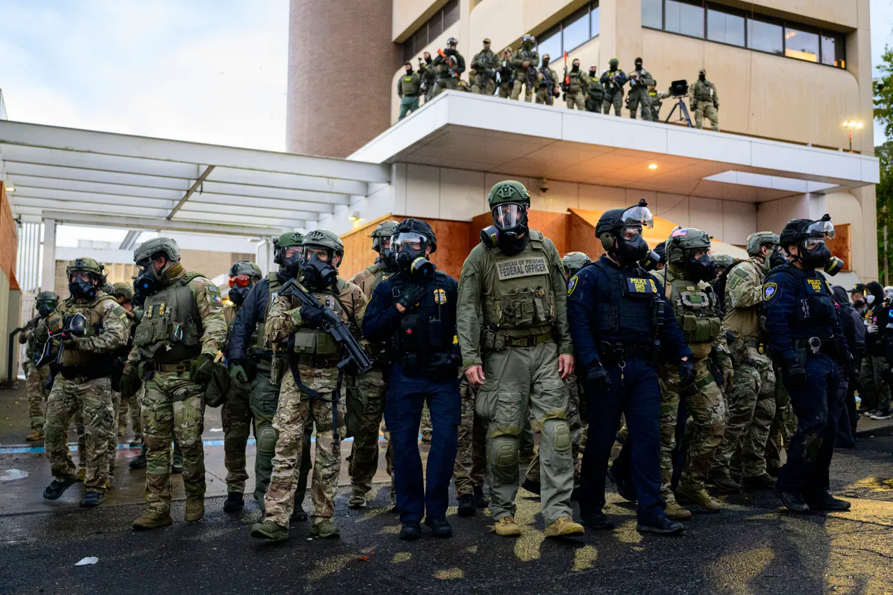 PORTLAND, OREGON - OCTOBER 12: Federal agents clash with anti-I.C.E. protesters at the U.S. Immigration and Customs Enforcement building on October 12, 2025 in Portland, Oregon. An Instagram post from the WorldNakedBikeRidePortland account stated -