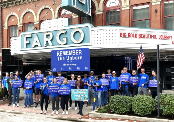 The North arm kickoff of the A-Cross America Relay in Fargo, North Dakota. NDSU Newman Center students helped launch the north arm with a 2.7 mile prayerful witness walk. Credit: Photo courtesy of LIFE Runners.