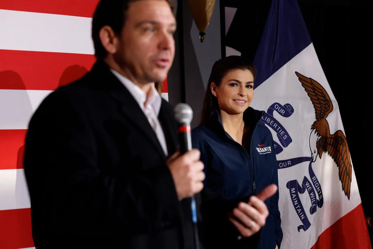 Casey DeSantis (R) listens as her husband, Republican presidential candidate Florida Gov. Ron DeSantis, speaks during a campaign event at the Chrome Horse Saloon one day before the Iowa caucuses on January 14, 2024 in Cedar Rapids, Iowa. DeSantis and fellow Republican presidential candidates have been adjusting their campaign schedules to deal with blizzard-like conditions in Iowa a day before the caucuses, the first primary competition of the 2024 election year. (Photo by Chip Somodevilla/Getty Images)