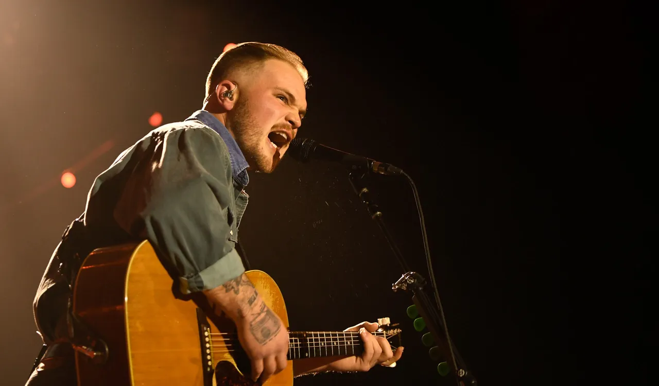 LAS VEGAS, NEVADA - FEBRUARY 09: Zach Bryan performs at The Chelsea at The Cosmopolitan of Las Vegas on February 09, 2024 in Las Vegas, Nevada. (Photo by Mindy Small/Getty Images)
