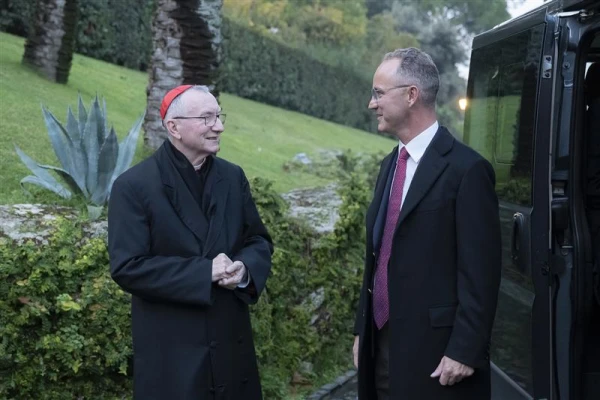 Pierre Louvrier greets Cardinal Pietro Parolin, Vatican secretary of state, during a visit to the Clementy Schuman Legacy Foundation roundtable at the Pontifical Academy of Sciences. Credit: Daniele Garofani