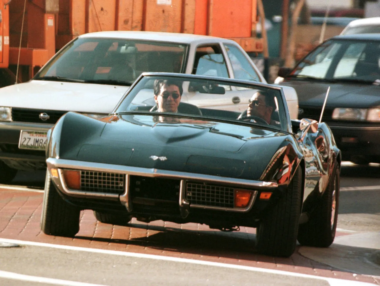 383519 01: Actors Jackie Chan, left, and Chris Tucker film a scene for 