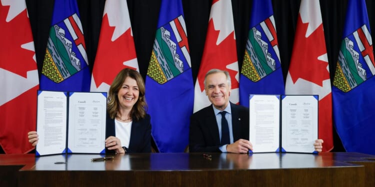 Mark Carney and Alberta's premier sign pipeline deal which could reverse oil tanker ban