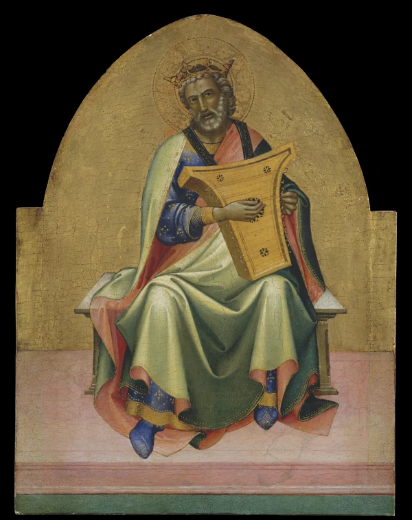 King David as Psalmist, from Florence, Italy, ca. 1408-10, by Lorenzo Monaco, who was born Piero di Giovanni but took the name Lorenzo Monaco, or Lorenzo the Monk, upon joining the monastery of Santa Maria degli Angeli, where he became a skilled illuminator and translated themes common to illuminated manuscripts into panel paintings, like this tempera on wood with gold ground depicting David seated on a stone bench tuning a psaltery, lips parted, prepared to sing, with a halo backing the crown he wears to signify the divine inspiration of his compositions. The Metropolitan Museum of Art, New York, 65.14.4. November 2025. Credit: Courtesy of the Metropolitan Museum of Art, New York