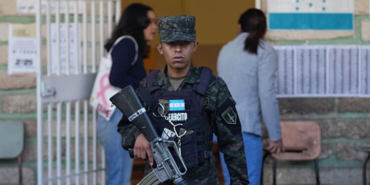 Voters to elect Honduran president in a close race under shadow of Trump's surprise intervention